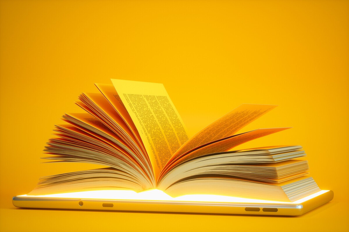 Libro abierto, símbolo de la difusión del conocimiento